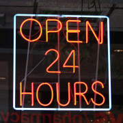 Neon sign which says - open 24 hours