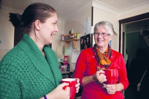 Two women talking over coffee